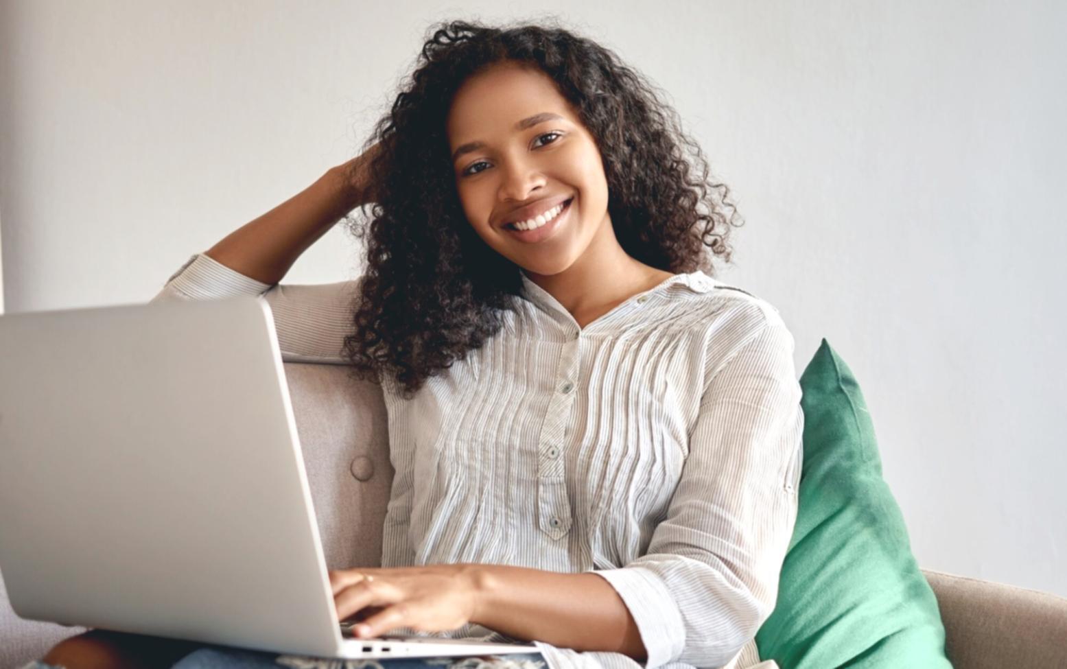 Financial analysis workspace with charts and data on screens