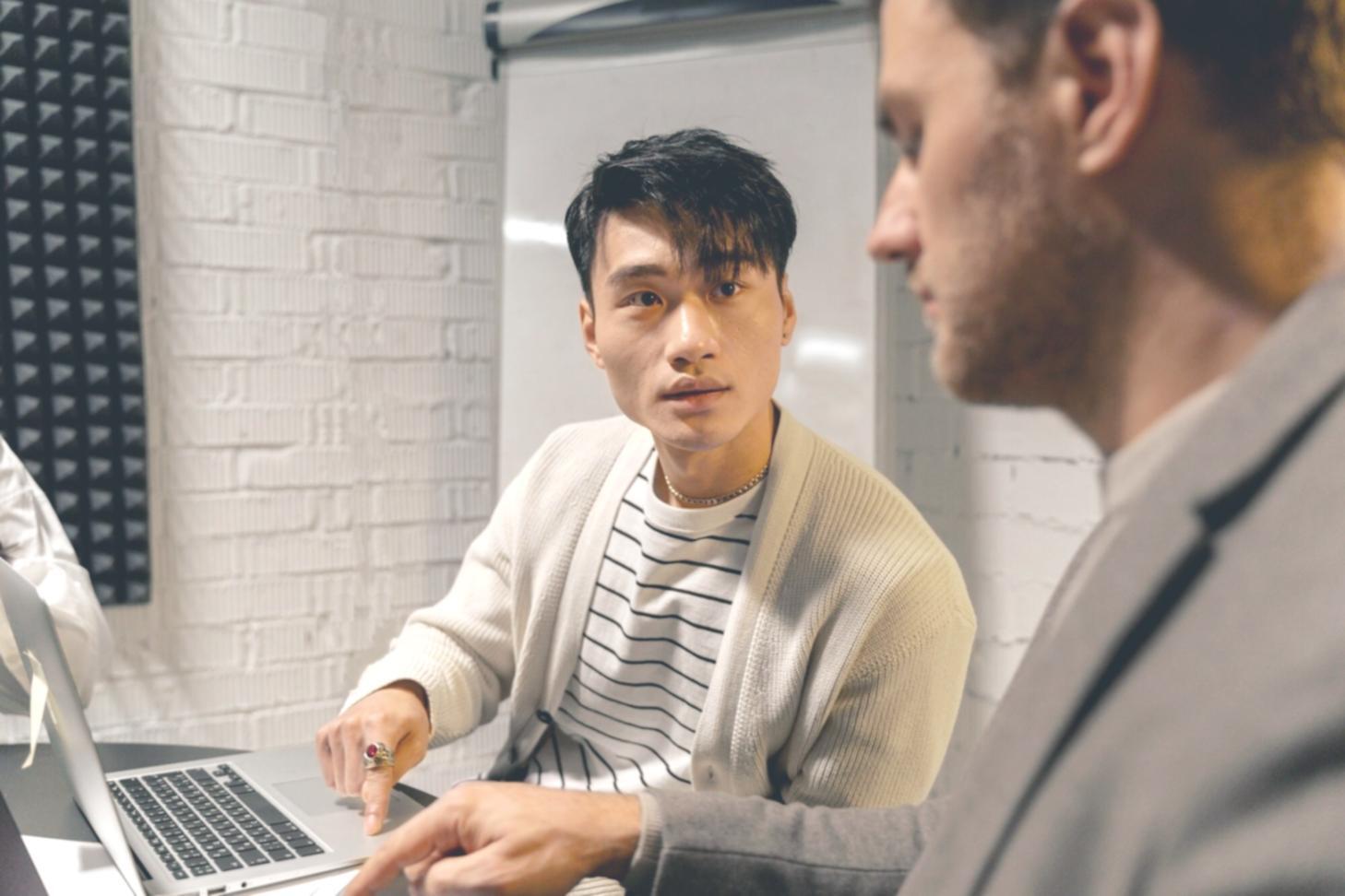 Financial analysis workspace with charts and research materials